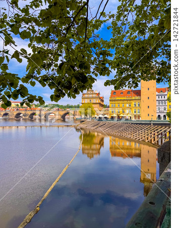 Prague riverside view with Charles Bridge and buildings in background Prague riverside view with Charles Bridge and buildings in background 142721844