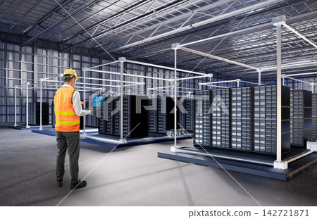 Programmer or engineer with computer notebook in data center Programmer or engineer with computer notebook in data center 142721871