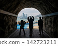Tourist family at iconic Huinnyeoul Coastal Tunnel, Busan 142723211
