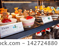 Cute cakes decorated with bears lined up in a cake shop in Keelung, Taiwan. 142724880