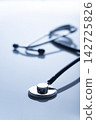Healthcare medical background of backlit stethoscope laying on table with copy-space 142725826