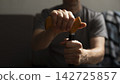 Middle age caucasian man hands holds cane closeup 142725857