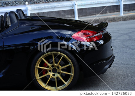 shiny black open car shiny black open car 142726053