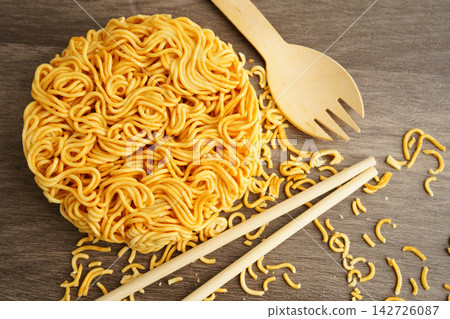 Instant noodles dry junk food with high sodium. Instant noodles dry junk food with high sodium. 142726087
