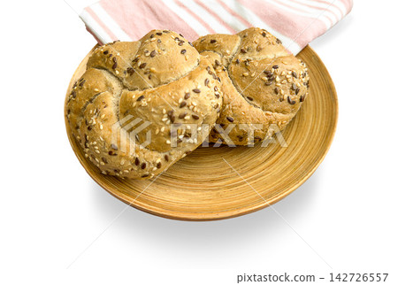 Seeded Kaiser rolls bread bakery multigrain sesame flax fresh golden buns on wooden plate with striped kitchen towel set Seeded Kaiser rolls bread bakery multigrain sesame flax fresh golden buns on wooden plate with striped kitchen towel set 142726557