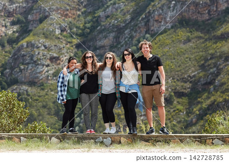 Friends, portrait and hug in outdoor nature, adventure and bonding for love on vacation for freedom. Happy people, embrace and hiking on weekend trip or holiday, travel and together for relationship Friends, portrait and hug in outdoor nature, adventure and bonding for love on vacation for freedom. Happy people, embrace and hiking on weekend trip or holiday, travel and together for relationship 142728785