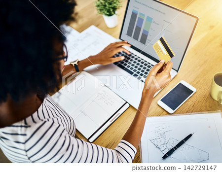 Woman, credit card and budget on laptop in home office, planning and website for expenses or income. Female person, ecommerce and finance or report on investment, online banking and graph for bills Woman, credit card and budget on laptop in home office, planning and website for expenses or income. Female person, ecommerce and finance or report on investment, online banking and graph for bills 142729147