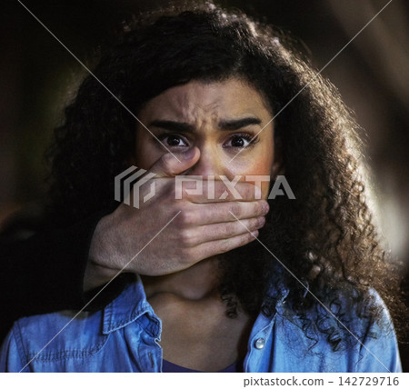 Woman, fear and criminal with hand on mouth, danger and violence in city or domestic issue with scared female person. Worried, victim and hostage or gender based assault, night and abuse kidnaping Woman, fear and criminal with hand on mouth, danger and violence in city or domestic issue with scared female person. Worried, victim and hostage or gender based assault, night and abuse kidnaping 142729716