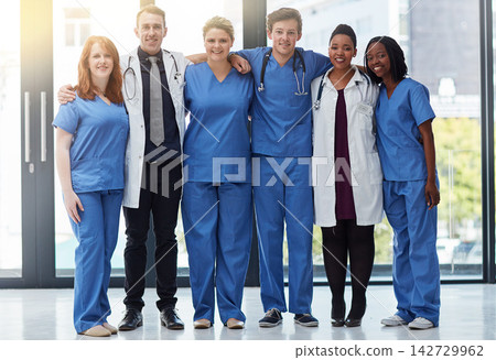 Happy, portrait and medical team in hospital for diversity, about us or support in clinic service. Smile, people and healthcare group, doctors and expert professional nurses together for wellness Happy, portrait and medical team in hospital for diversity, about us or support in clinic service. Smile, people and healthcare group, doctors and expert professional nurses together for wellness 142729962