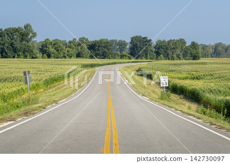 highway in rural central MIssouri with corn fields, summer scenery highway in rural central MIssouri with corn fields, summer scenery 142730097