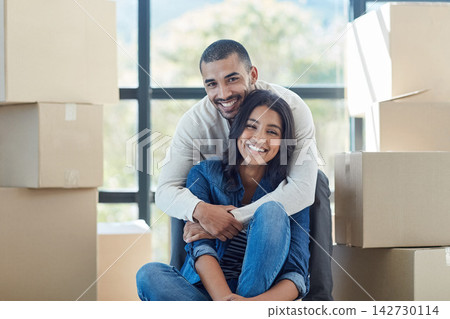 Couple, portrait and box with hug for new home with support, bonding and happiness for dream house. Homeowner, man and woman in relationship excited for relocation, property investment and moving Couple, portrait and box with hug for new home with support, bonding and happiness for dream house. Homeowner, man and woman in relationship excited for relocation, property investment and moving 142730114
