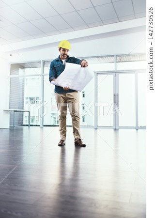 Architecture, man and reading blueprint for design, safety and floor plan with upgrade for development as project management. Male engineer, paper and construction worker for sketch of renovation Architecture, man and reading blueprint for design, safety and floor plan with upgrade for development as project management. Male engineer, paper and construction worker for sketch of renovation 142730526