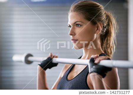 Fitness, health and woman training with barbell for weight lifting exercise, muscle endurance and strength competition. Sports, female bodybuilder and athlete in gym for workout and commitment Fitness, health and woman training with barbell for weight lifting exercise, muscle endurance and strength competition. Sports, female bodybuilder and athlete in gym for workout and commitment 142731277