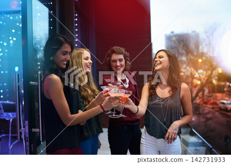Women, friends and group toast with cocktail at pub together for celebration, event or happy hour at night club. Cheers, party and girls with alcohol glass at bar for social gathering, drink or laugh Women, friends and group toast with cocktail at pub together for celebration, event or happy hour at night club. Cheers, party and girls with alcohol glass at bar for social gathering, drink or laugh 142731933