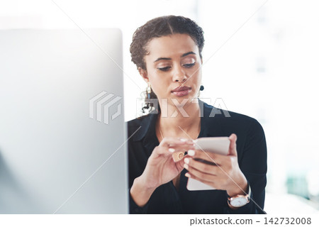 Woman, employee and smartphone at office browsing internet or for social media post and news update. Female person, computer and searching for online application, networking or communication 142732008