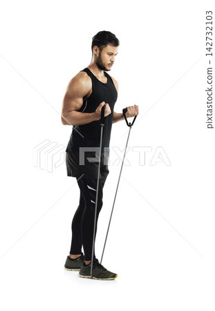 Fitness, health and man with resistance bands for strength training and muscle endurance isolated in studio. Serious, male person and athlete stretching with equipment for rehabilitation and recovery Fitness, health and man with resistance bands for strength training and muscle endurance isolated in studio. Serious, male person and athlete stretching with equipment for rehabilitation and recovery 142732103