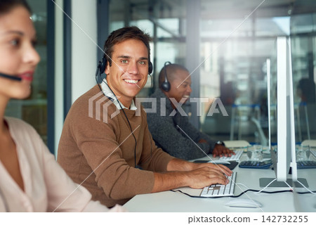 Happy, man and portrait in call center for technical support and help in virtual customer care. Employee, consultant and contact us for advice, feedback and crm communication with solution to faq Happy, man and portrait in call center for technical support and help in virtual customer care. Employee, consultant and contact us for advice, feedback and crm communication with solution to faq 142732255