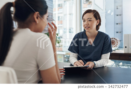 Nurse, woman and clipboard or patient for healthcare with discussion, medical history and diagnosis in clinic office. Consultation, expert and person with questions, treatment and checkup with advice Nurse, woman and clipboard or patient for healthcare with discussion, medical history and diagnosis in clinic office. Consultation, expert and person with questions, treatment and checkup with advice 142732477