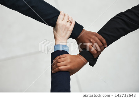 Studio, business people and hands together for teamwork, support and solidarity in workplace. White background, cooperation and company growth of corporate firm, networking and employees with trust Studio, business people and hands together for teamwork, support and solidarity in workplace. White background, cooperation and company growth of corporate firm, networking and employees with trust 142732648