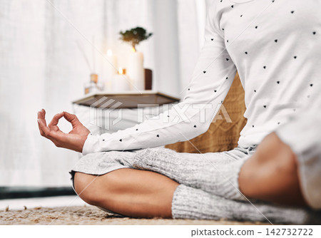 Hand, relax and meditation on floor in home for chakra healing, balance and mental health on weekend. House, peace and zen person with spiritual connection for holistic, awareness and balance on mat Hand, relax and meditation on floor in home for chakra healing, balance and mental health on weekend. House, peace and zen person with spiritual connection for holistic, awareness and balance on mat 142732722