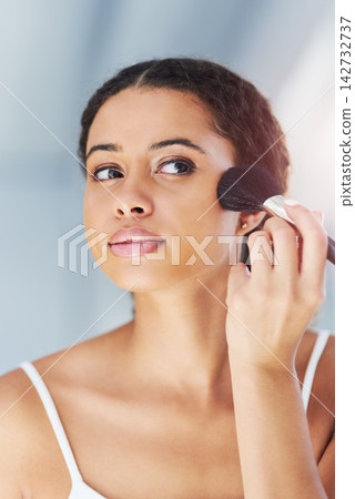 Beauty, makeup brush and black woman on cheek in bathroom for cosmetics, grooming or foundation. Powder, hand and female person with tools for applying contour, glowing skin or getting ready in home Beauty, makeup brush and black woman on cheek in bathroom for cosmetics, grooming or foundation. Powder, hand and female person with tools for applying contour, glowing skin or getting ready in home 142732737