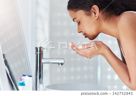 Home, tap and washing face with woman, skincare and wellness with beauty, grooming routine or water. Apartment, person or girl in bathroom, faucet or wet with clear skin, cleaning or personal hygiene Home, tap and washing face with woman, skincare and wellness with beauty, grooming routine or water. Apartment, person or girl in bathroom, faucet or wet with clear skin, cleaning or personal hygiene 142732843