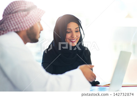 Muslim, people and coworking teamwork on project and mentor help on laptop in Dubai office. Arab, man and woman in business learning, training or collaboration with professional advice from manager Muslim, people and coworking teamwork on project and mentor help on laptop in Dubai office. Arab, man and woman in business learning, training or collaboration with professional advice from manager 142732874