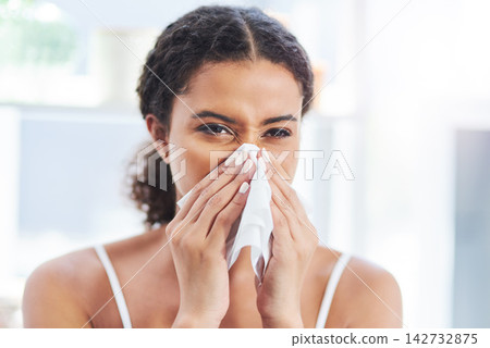 Home, tissue and woman with sneeze, sick and cold with disease, allergy and health crisis in living room. Apartment, person and girl with congestion, viral infection and flu season with hay fever Home, tissue and woman with sneeze, sick and cold with disease, allergy and health crisis in living room. Apartment, person and girl with congestion, viral infection and flu season with hay fever 142732875