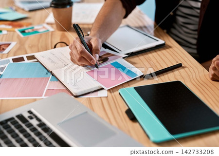 Laptop, notebook and hands of person for graphic design, research and online project in office. Digital, internet and creative ideas for website with technology, software and designer writing at desk Laptop, notebook and hands of person for graphic design, research and online project in office. Digital, internet and creative ideas for website with technology, software and designer writing at desk 142733208