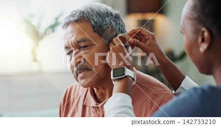 Nurse, patient and hearing aid on ear for medical support, wellness and innovation of disability. People, healthcare worker and deaf man with audiology implant, service or help for sound waves Nurse, patient and hearing aid on ear for medical support, wellness and innovation of disability. People, healthcare worker and deaf man with audiology implant, service or help for sound waves 142733210