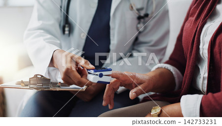 Closeup, patient or doctor in pulse, oximeter or test as health, support or analysis of blood oxygen. Black healthcare worker, mature woman or digital tech as medical diagnosis tools to monitor risk 142733231