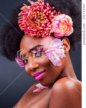 Beauty, eyelashes and flowers with portrait of black woman in studio on dark background for natural makeup. Afro, cosmetics and face of young model with protea in hair for aesthetic wellness at spa 142733347