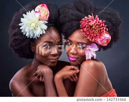 Spring flowers, portrait and black women with makeup on dark background for organic cosmetics, makeover or skin glow in studio. Beauty, afro and models with plant for aesthetic, eyelashes or lipstick Spring flowers, portrait and black women with makeup on dark background for organic cosmetics, makeover or skin glow in studio. Beauty, afro and models with plant for aesthetic, eyelashes or lipstick 142733368