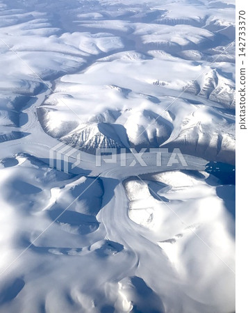 Aerial view of Greenland's majestic glaciers. Aerial view of Greenland's majestic glaciers. 142733370