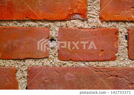 Zoom, red and stone wall for concrete building or structural material for architecture, texture and surface. Brick, masonry and clay or cement to hold or plaster together for construction and design. Zoom, red and stone wall for concrete building or structural material for architecture, texture and surface. Brick, masonry and clay or cement to hold or plaster together for construction and design. 142733371