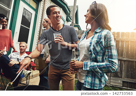 Friends, people and beer in garden with bbq for social event, party and celebration with laughing in home. group, drinking alcohol and food with relax, conversation and diversity at barbecue reunion 142733563