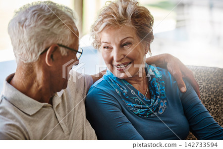 Smile, mature and couple with love on sofa at house, living room and bonding with hug for care together. Happy, woman and man in marriage for healthy relationship with trust, support and partner Smile, mature and couple with love on sofa at house, living room and bonding with hug for care together. Happy, woman and man in marriage for healthy relationship with trust, support and partner 142733594