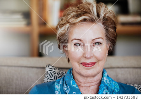 Senior woman, home and couch in portrait for relax with retirement, beauty glow with cosmetics. Female person, living room and sofa with smile for wellness, makeup and aesthetics for pensioner Senior woman, home and couch in portrait for relax with retirement, beauty glow with cosmetics. Female person, living room and sofa with smile for wellness, makeup and aesthetics for pensioner 142733598