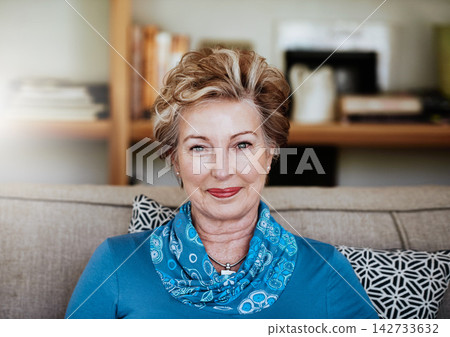 Portrait, mature and woman for relax on sofa at house with smile, relaxing and peace in calm living room. Confident, grandmother and couch in lounge with care, retirement and wellness with wrinkles Portrait, mature and woman for relax on sofa at house with smile, relaxing and peace in calm living room. Confident, grandmother and couch in lounge with care, retirement and wellness with wrinkles 142733632