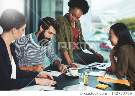 Business people, meeting and employee training with paperwork for learning and brainstorming in office. Trainee group, teamwork and training seminar with documents for intern feedback and support 142733799