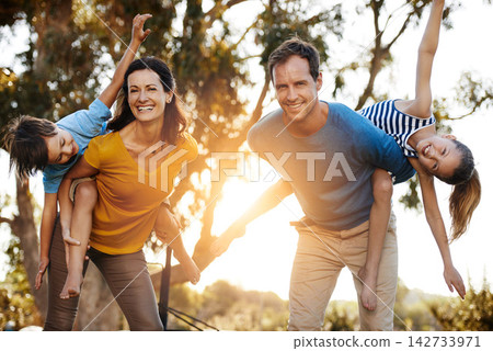 Portrait, family and piggyback kids at park for love, care or bonding together in nature. Mother, father or carry children at garden for airplane game, support or happy parents play on summer holiday Portrait, family and piggyback kids at park for love, care or bonding together in nature. Mother, father or carry children at garden for airplane game, support or happy parents play on summer holiday 142733971