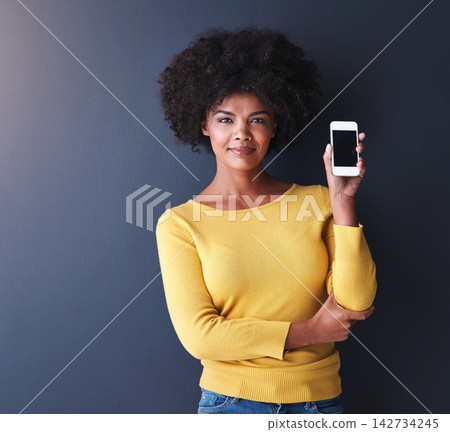 Happy, woman and smartphone in portrait on background in streaming, app for entertainment or browsing in e commerce. Cheerful, female person and tech in studio with space, social media or shopping Happy, woman and smartphone in portrait on background in streaming, app for entertainment or browsing in e commerce. Cheerful, female person and tech in studio with space, social media or shopping 142734245