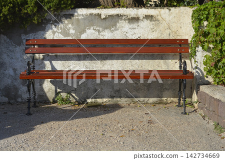 Empty wooden bench Empty wooden bench 142734669