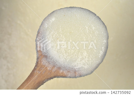 Semolina Porridge on a Wooden Spoon Semolina Porridge on a Wooden Spoon 142735092