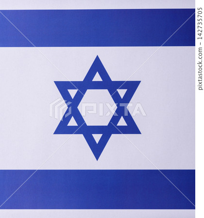 Israel, the Israeli flag as a symbol of national independence. The Israeli flag Israel, the Israeli flag as a symbol of national independence. The Israeli flag 142735705