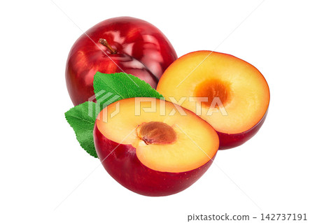 fresh red plum half with leaves isolated on white background 142737191