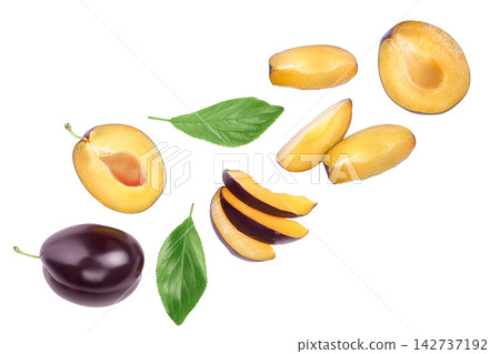 fresh purple plum and half isolated on white background with clipping path and full depth of field. Top view. Flat lay 142737192