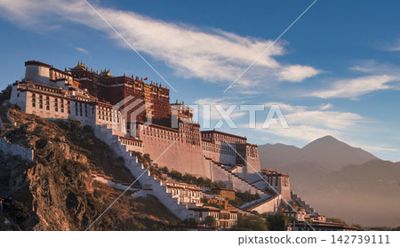 Potala Palace in Lhasa, Tibet, China, at Sunset with Golden Light on Historic Architecture 142739111