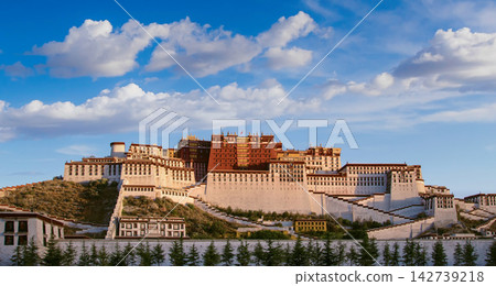 Potala Palace in Lhasa, Tibet, China, under a blue sky with white clouds Potala Palace in Lhasa, Tibet, China, under a blue sky with white clouds 142739218