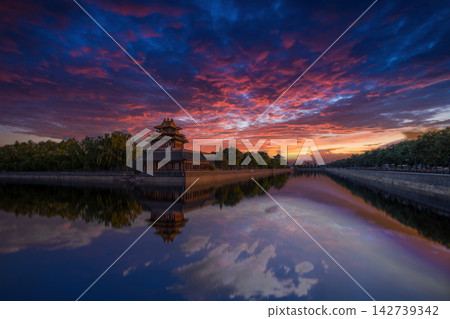Vibrant Sunset Reflection on the Moat of the Forbidden City in Beijing, China Vibrant Sunset Reflection on the Moat of the Forbidden City in Beijing, China 142739342